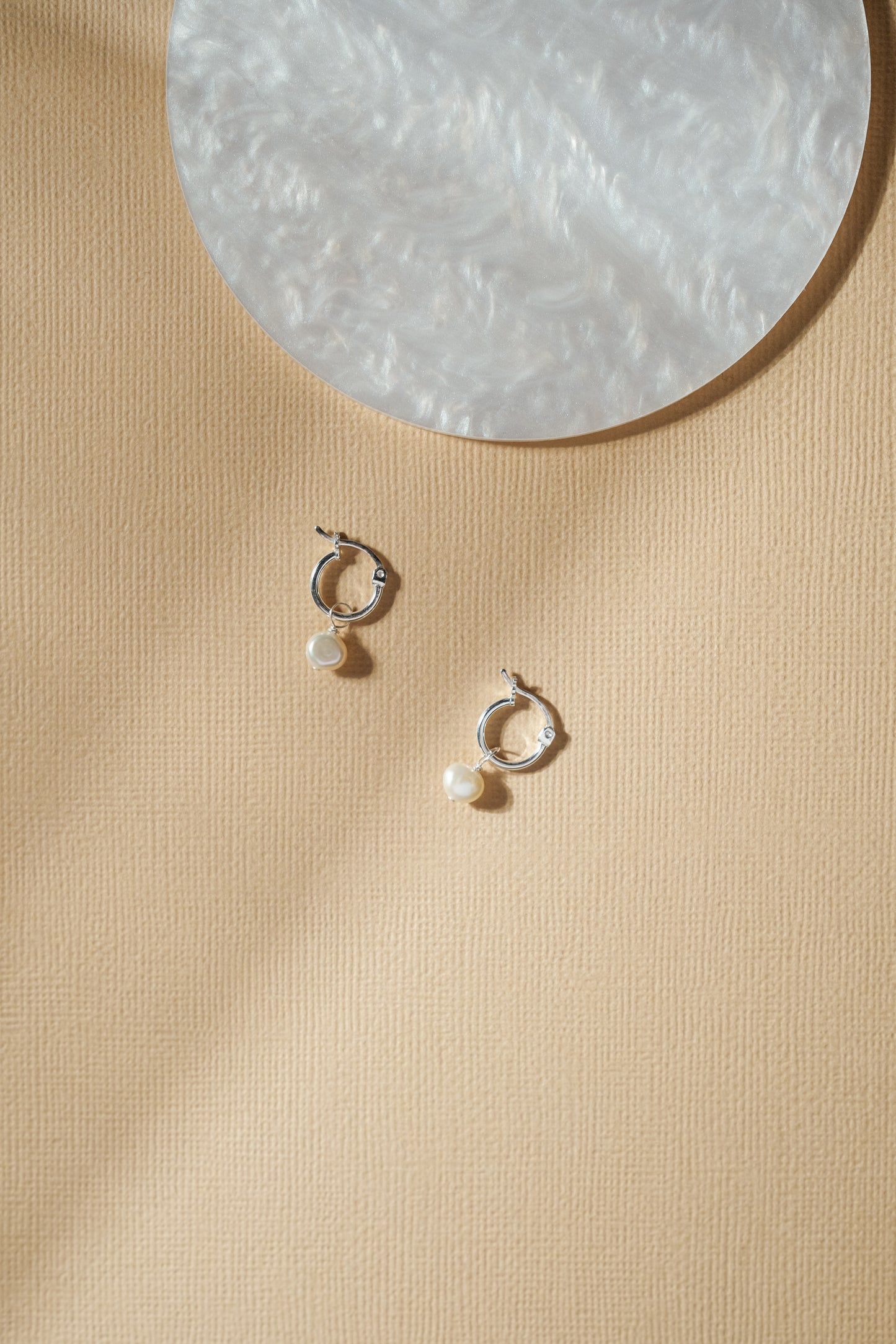 Pearl mini hoop earrings