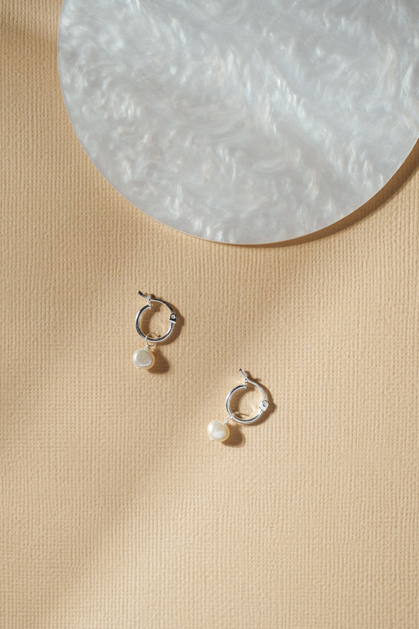 Pearl mini hoop earrings